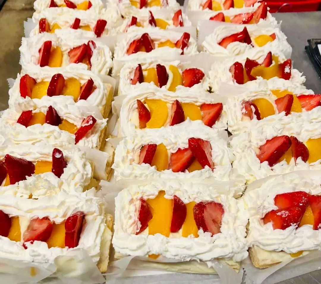 Tres leches slices with strawberries